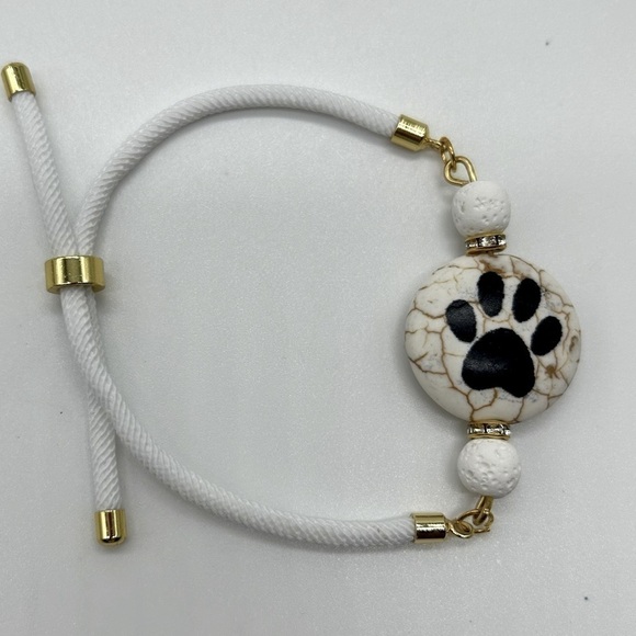 Brand new Dog paw bead 🐾 white lava stones strong cord unisex handmade bracelet. - Picture 1 of 6